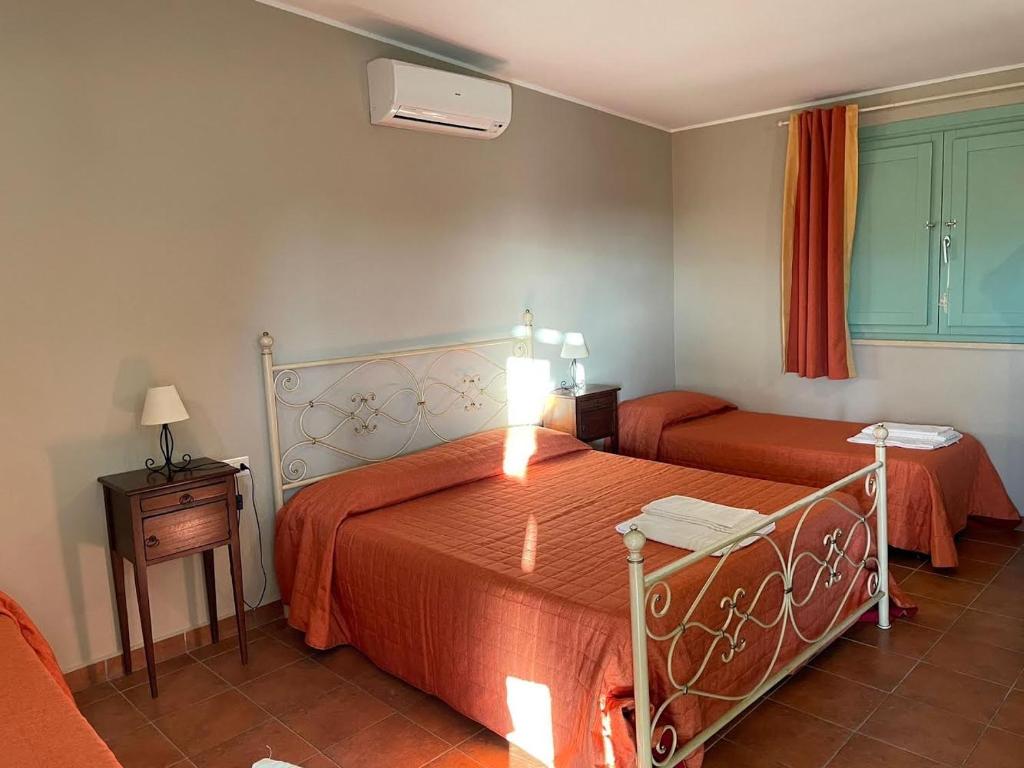 Postel nebo postele na pokoji v ubytování Borgo Nocchiara