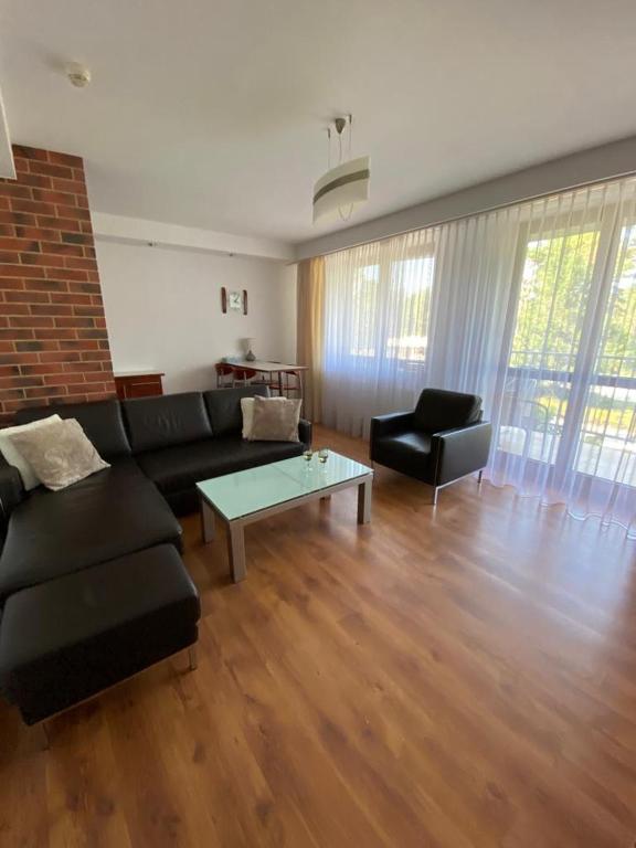 Posedenie v ubytovaní Apartamenty Żeromskiego przy promenadzie i morzu