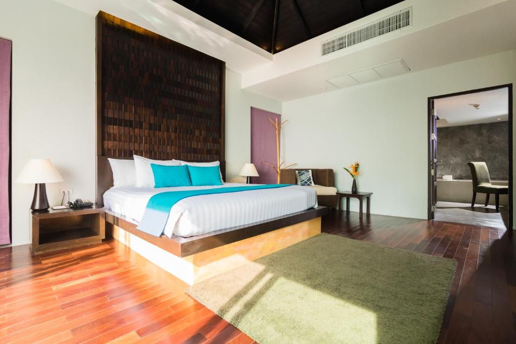 Postel nebo postele na pokoji v ubytování Andamantra Resort and Villa Phuket - SHA Extra Plus