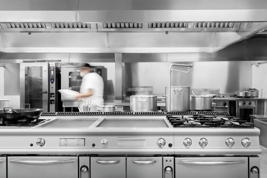 Kuchyň nebo kuchyňský kout v ubytování Hotel Anabel