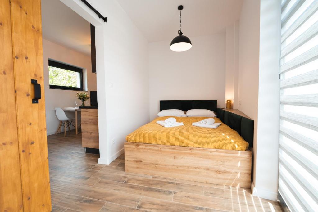 Posteľ alebo postele v izbe v ubytovaní Apartamenty Nadrzeczna nad Wisłą Dream Apart