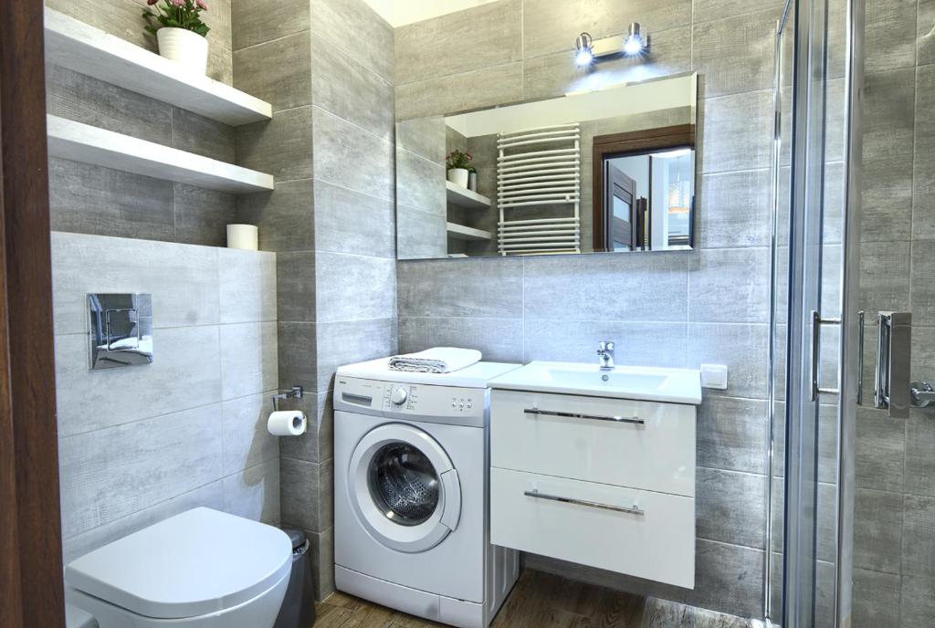 Kúpeľňa v ubytovaní Wola Luxury Stay