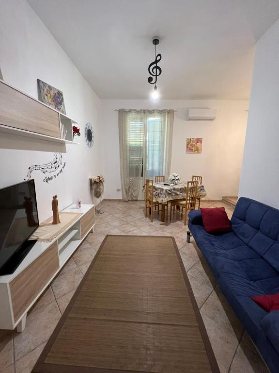 Televízia a/alebo spoločenská miestnosť v ubytovaní House Corso Calatafimi