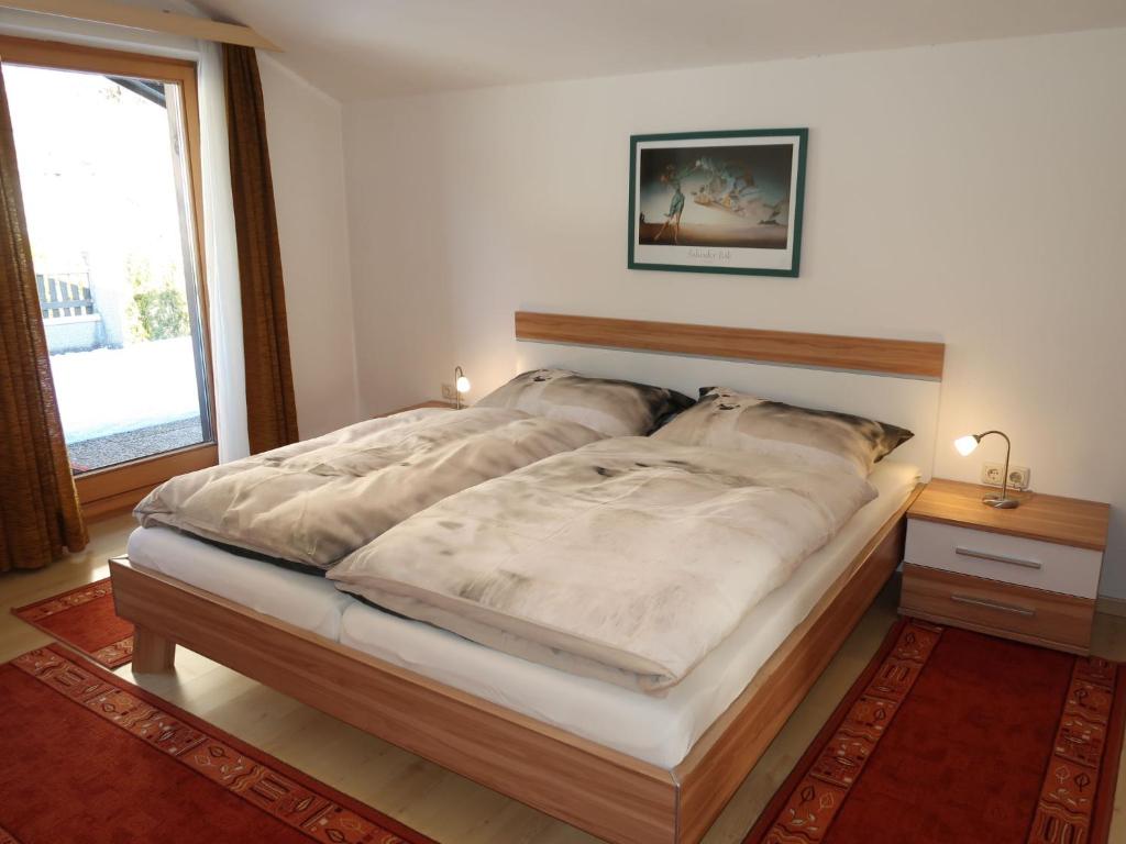 Postel nebo postele na pokoji v ubytování Apartment Fill by Interhome