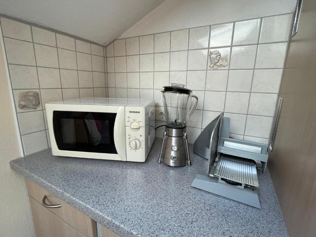 Kuchyň nebo kuchyňský kout v ubytování Apartment Fill by Interhome