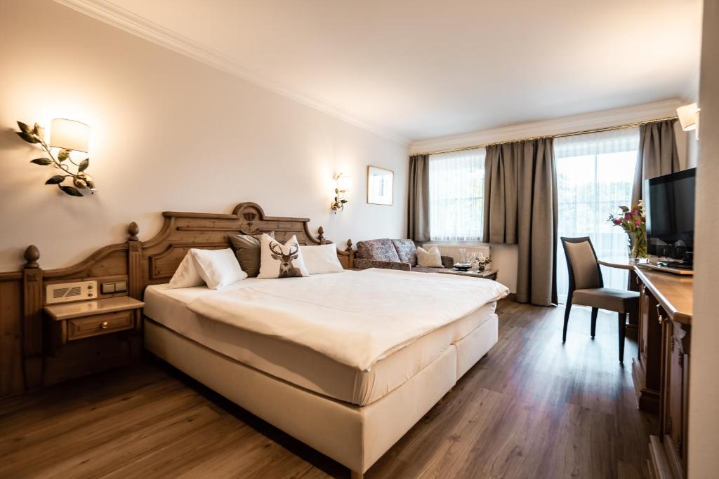 TV a/nebo společenská místnost v ubytování Hotel Hubertushof