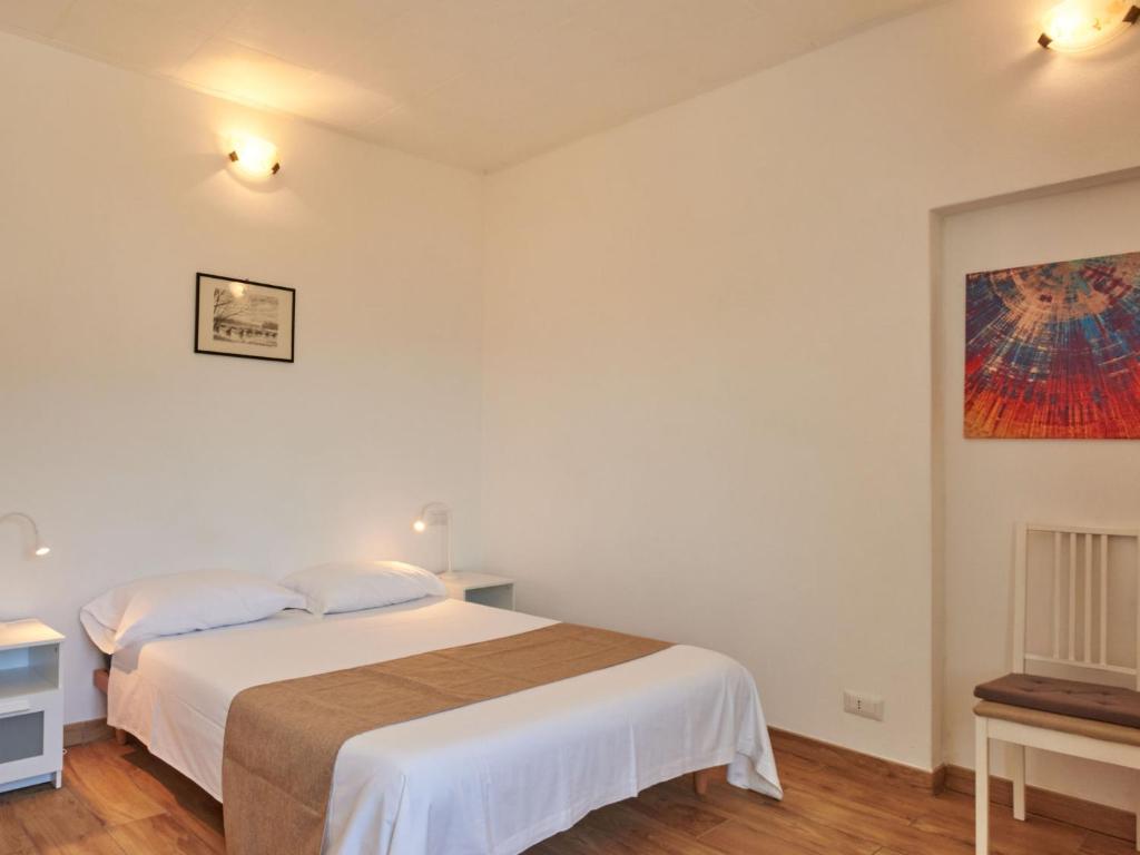 Postel nebo postele na pokoji v ubytování Apartment Minú by Interhome