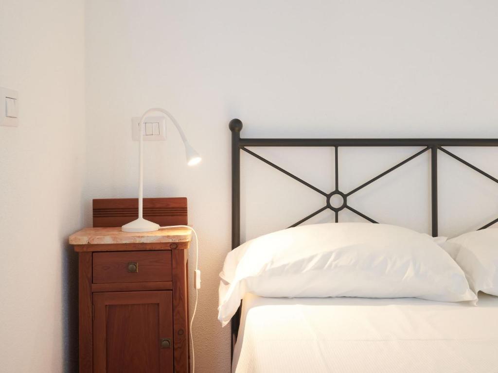 Postel nebo postele na pokoji v ubytování Apartment Minú by Interhome