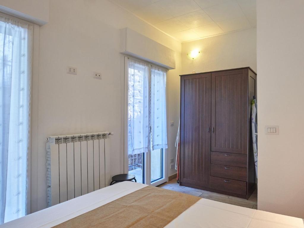 Postel nebo postele na pokoji v ubytování Apartment Minú by Interhome