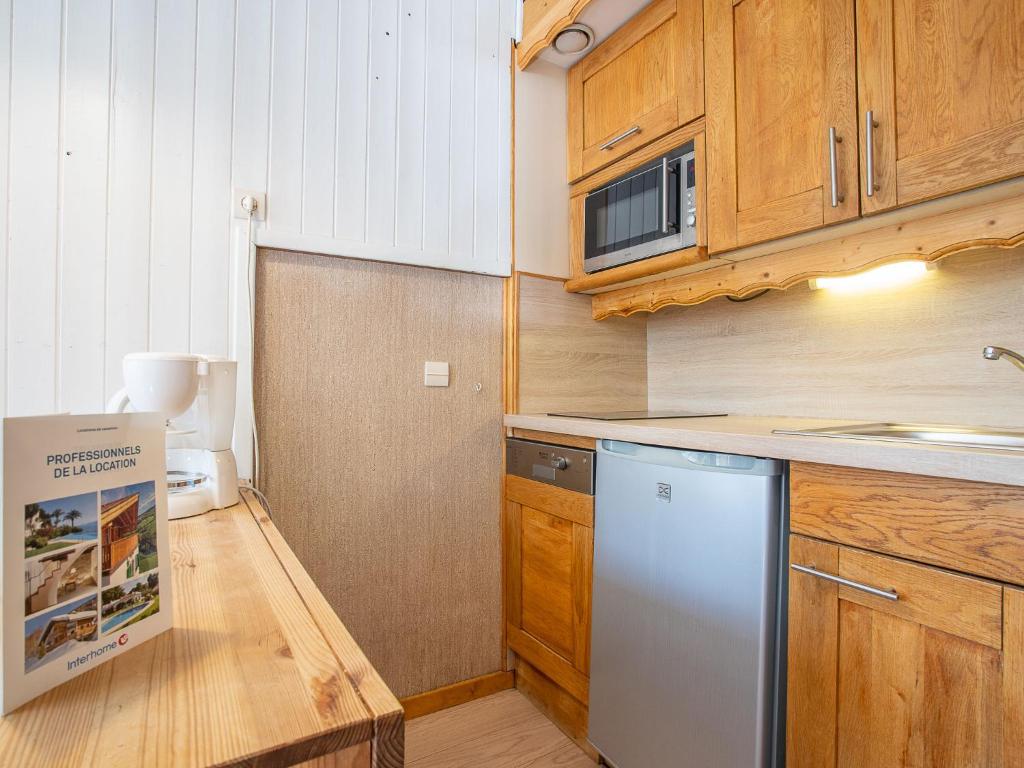 Kuchyň nebo kuchyňský kout v ubytování Apartment Arcelle 505 by Interhome