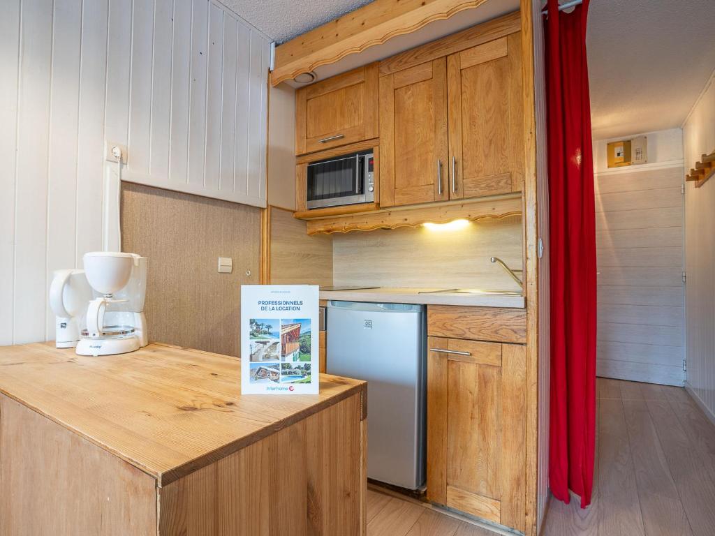 Kuchyň nebo kuchyňský kout v ubytování Apartment Arcelle 505 by Interhome