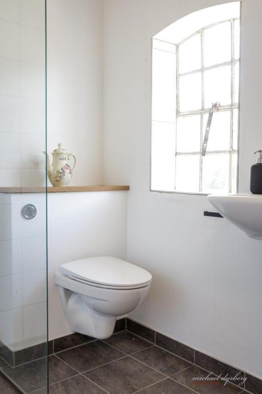 Koupelna v ubytování Ragnhilds Gård, Hostel