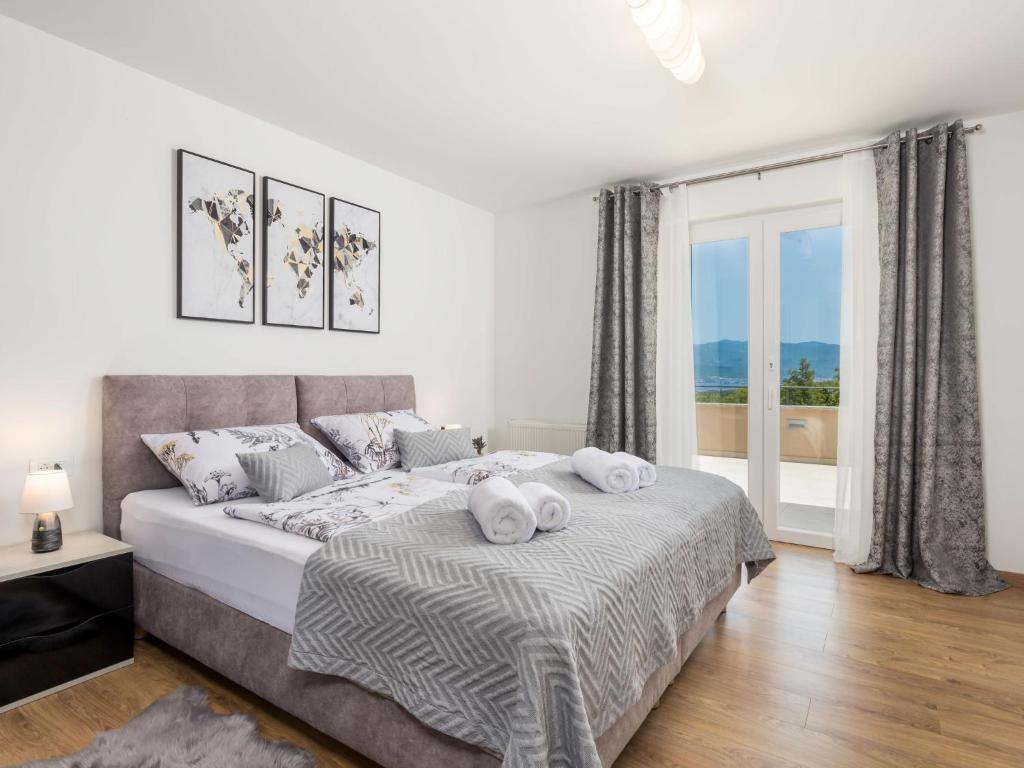 Postel nebo postele na pokoji v ubytování Villa Matea by Interhome