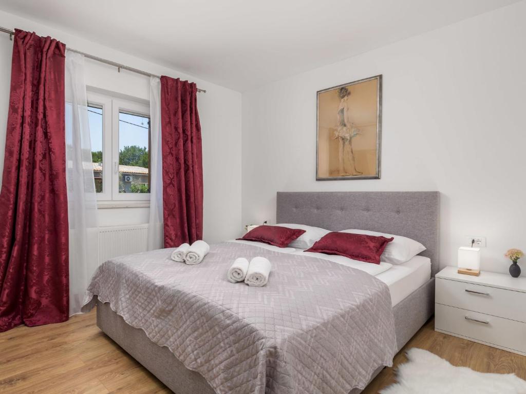 Postel nebo postele na pokoji v ubytování Villa Matea by Interhome