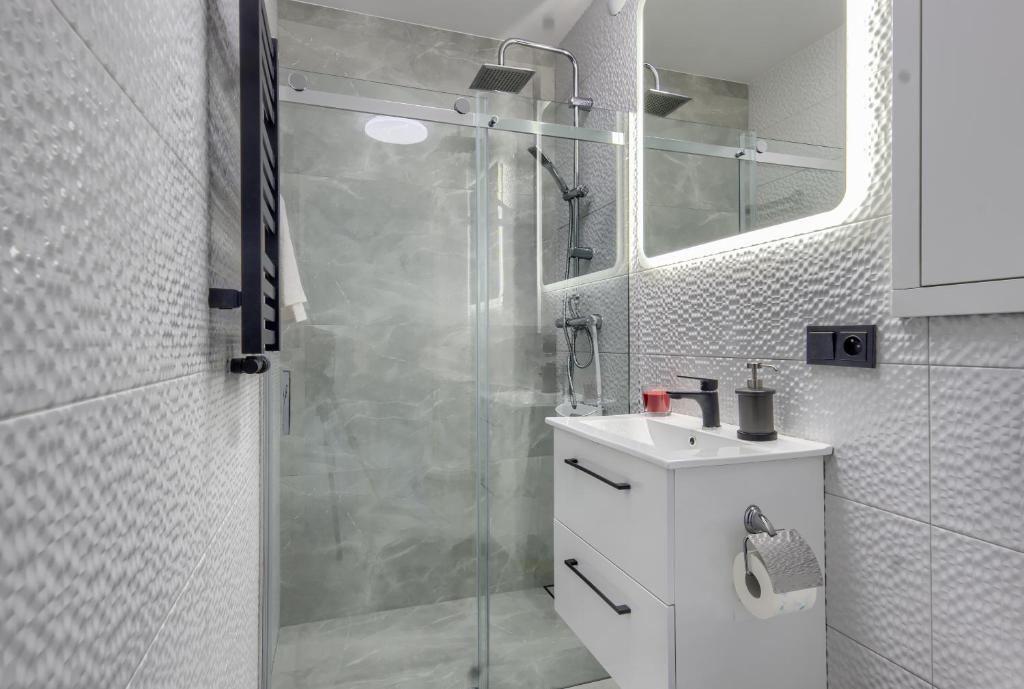 Kúpeľňa v ubytovaní Wola Luxury Stay