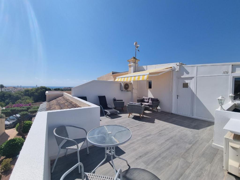 A balcony or terrace at 3 Bedroom Apartment Playa Flamenca La Zenia