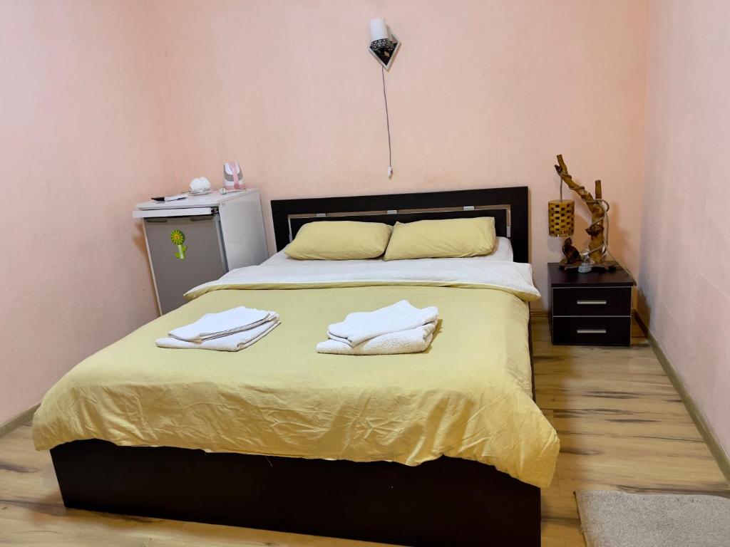 Postel nebo postele na pokoji v ubytování Hotel Maria