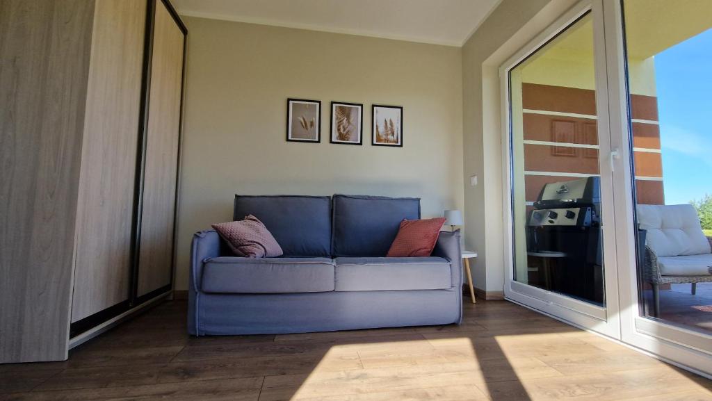 Część wypoczynkowa w obiekcie Apartament Golf & Nature - Na Polu Golfowym
