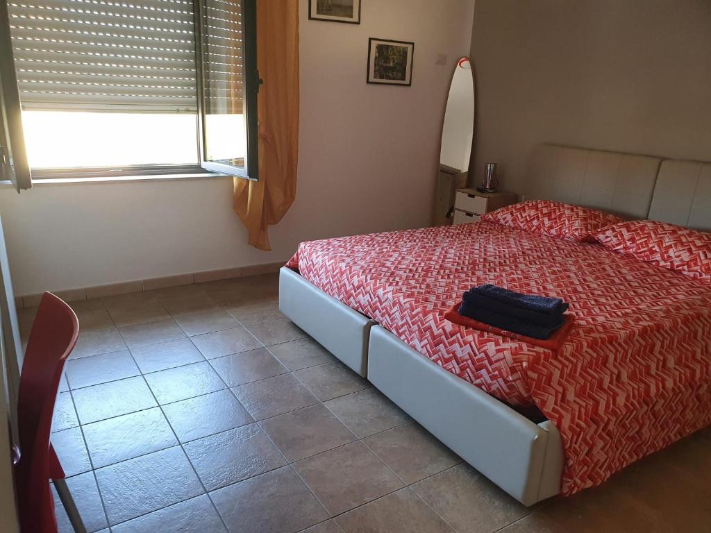 Postel nebo postele na pokoji v ubytování B&b Paolo e Daniela
