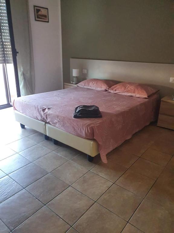 Postel nebo postele na pokoji v ubytování B&b Paolo e Daniela