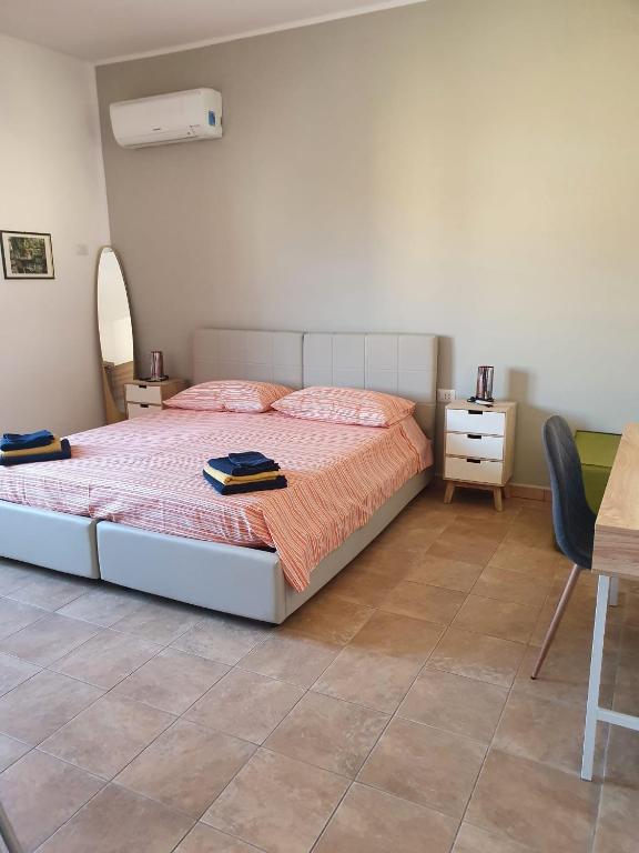 Postel nebo postele na pokoji v ubytování B&b Paolo e Daniela
