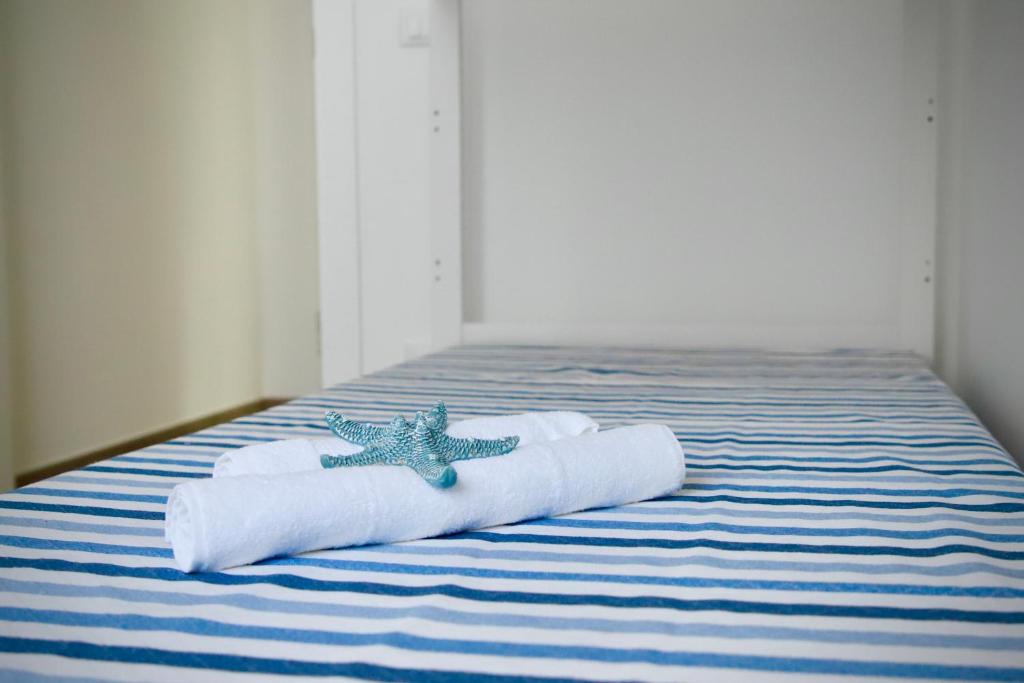 Posteľ alebo postele v izbe v ubytovaní Casa Magia