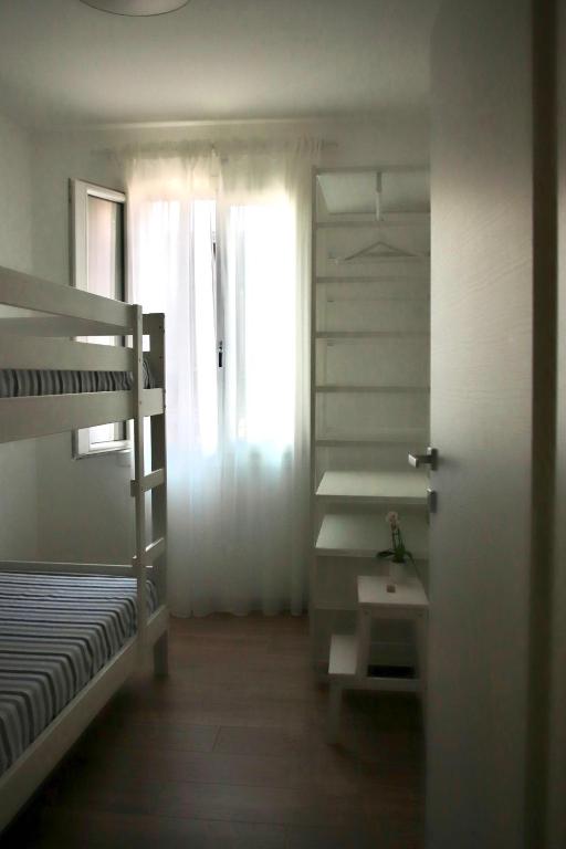 Posteľ alebo postele v izbe v ubytovaní Casa Magia