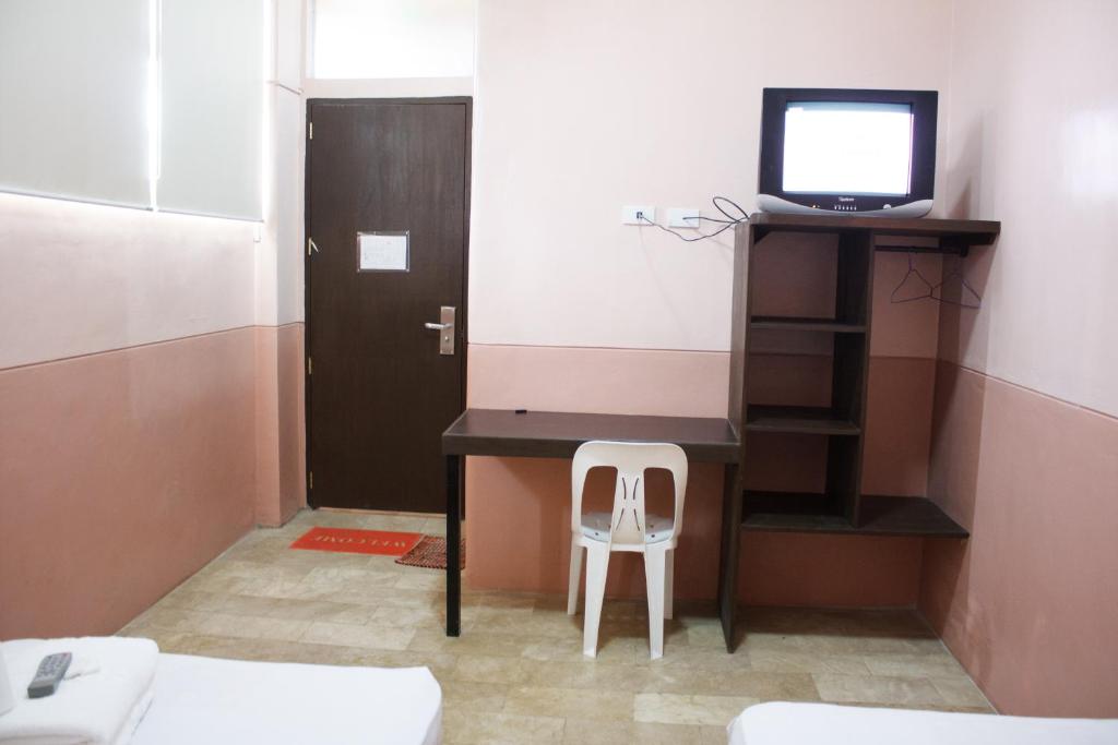Postel nebo postele na pokoji v ubytování GV Hotel - Borongan