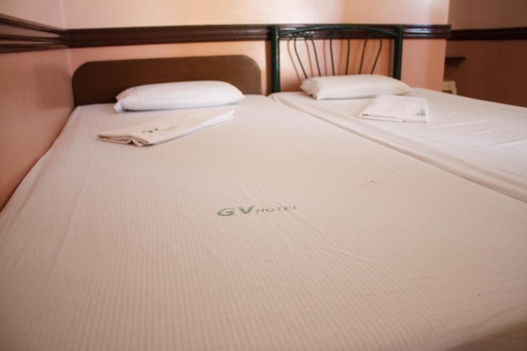 Postel nebo postele na pokoji v ubytování GV Hotel - Catarman