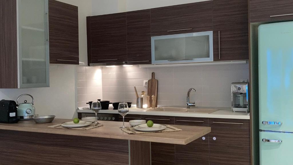 Kuchyň nebo kuchyňský kout v ubytování Bright Luxury Apt.