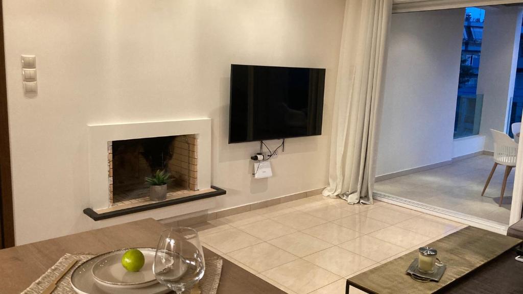 TV a/nebo společenská místnost v ubytování Bright Luxury Apt.