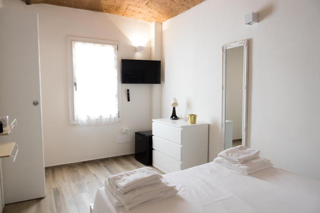 Postel nebo postele na pokoji v ubytování Villa Viani