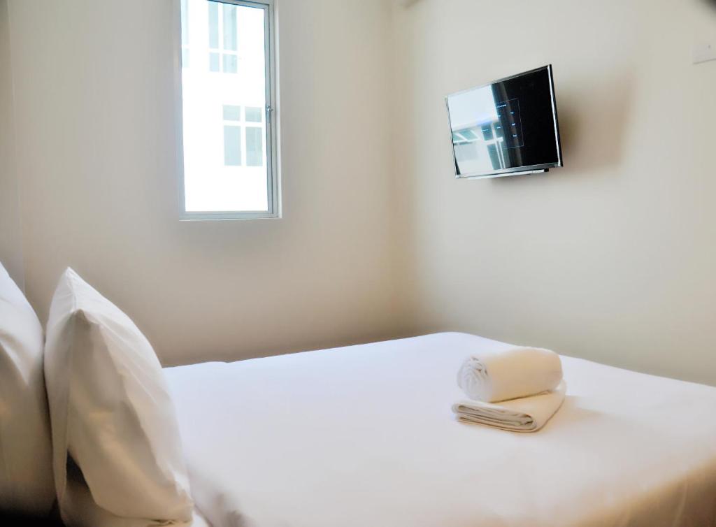 TV a/nebo společenská místnost v ubytování Gem Hotel Nusa Sentral Nusajaya