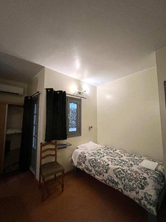 Postel nebo postele na pokoji v ubytování Abrigo do Portinho