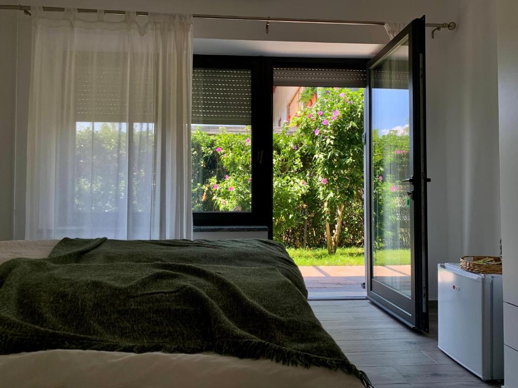 מיטה או מיטות בחדר ב-Panorama rooms