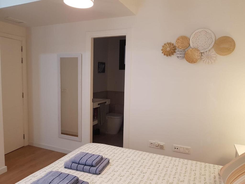 Postel nebo postele na pokoji v ubytování Apartamento Plaza del Teatro Parking free
