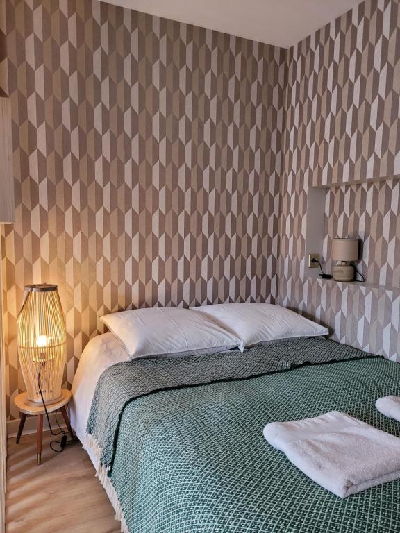 Posteľ alebo postele v izbe v ubytovaní Deauville centre et mer