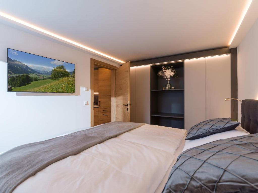 Posteľ alebo postele v izbe v ubytovaní Haus Rass