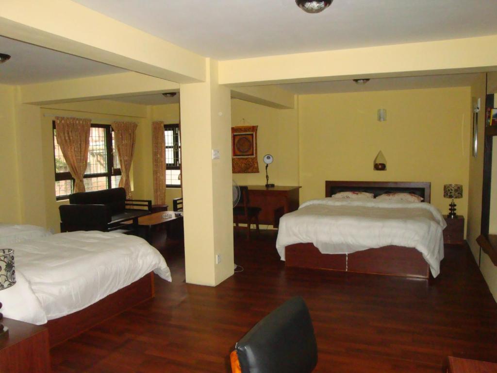 Kumari Guest House - Chambre Quadruple