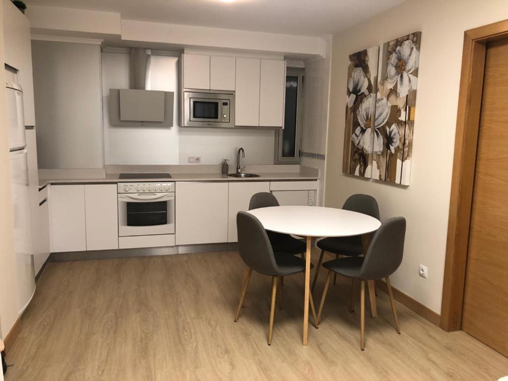 Kuchyň nebo kuchyňský kout v ubytování Apartamentos Boutique Arquera Golf I