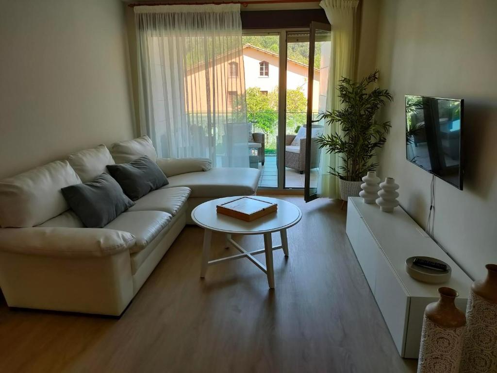 Posezení v ubytování Apartamentos Boutique Arquera Golf I