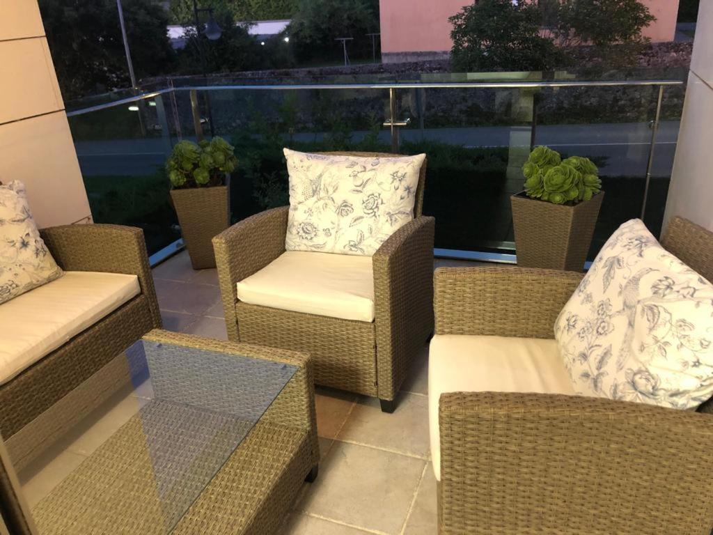 Posezení v ubytování Apartamentos Boutique Arquera Golf I