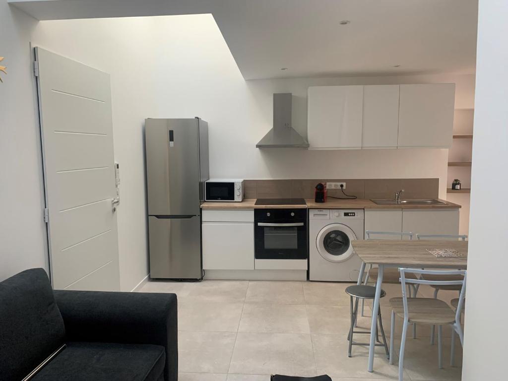 Kuchyňa alebo kuchynka v ubytovaní Superbe Appartement Redon