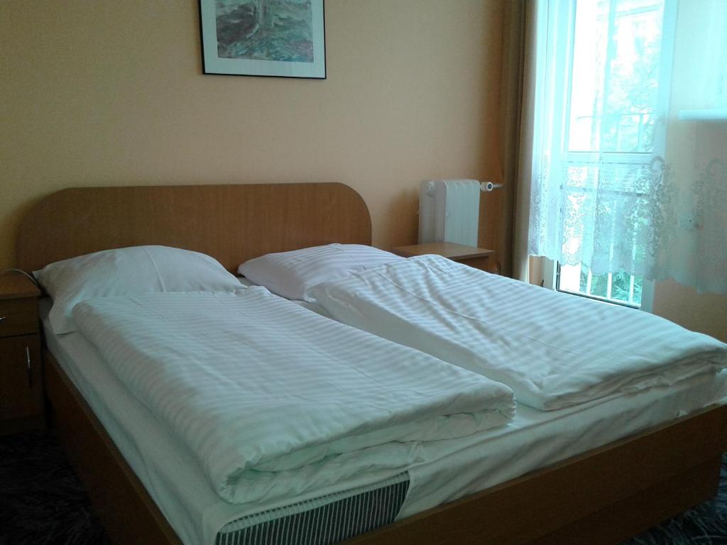 Postel nebo postele na pokoji v ubytování Hostel Refleks
