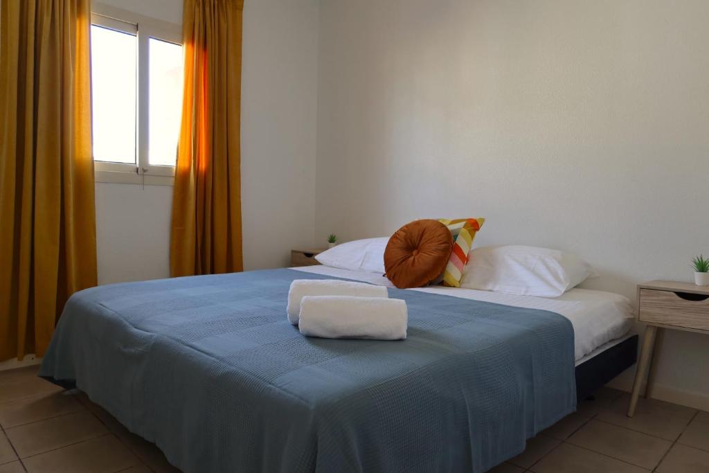 Postel nebo postele na pokoji v ubytování Montana Eco Resort Aruba