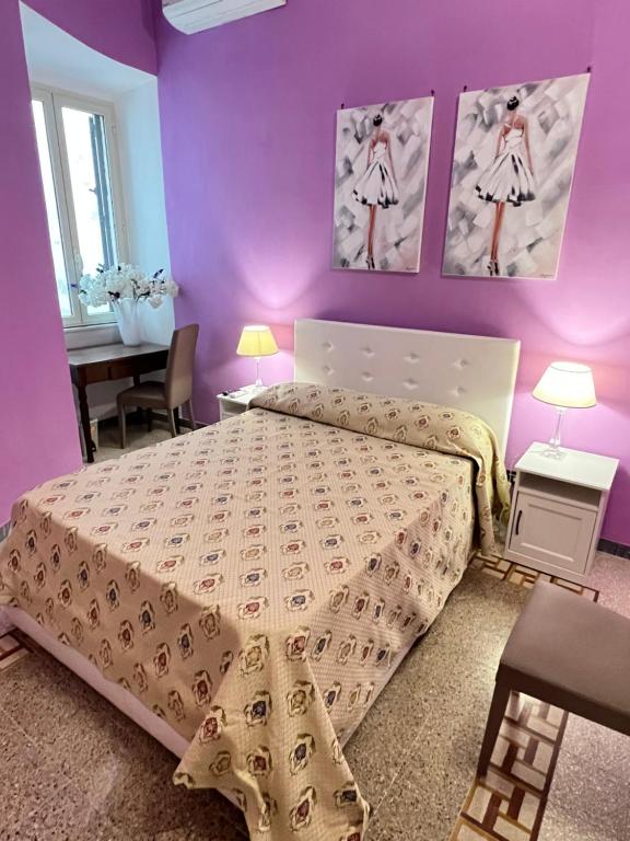 Кровать или кровати в номере Guest House Biondi