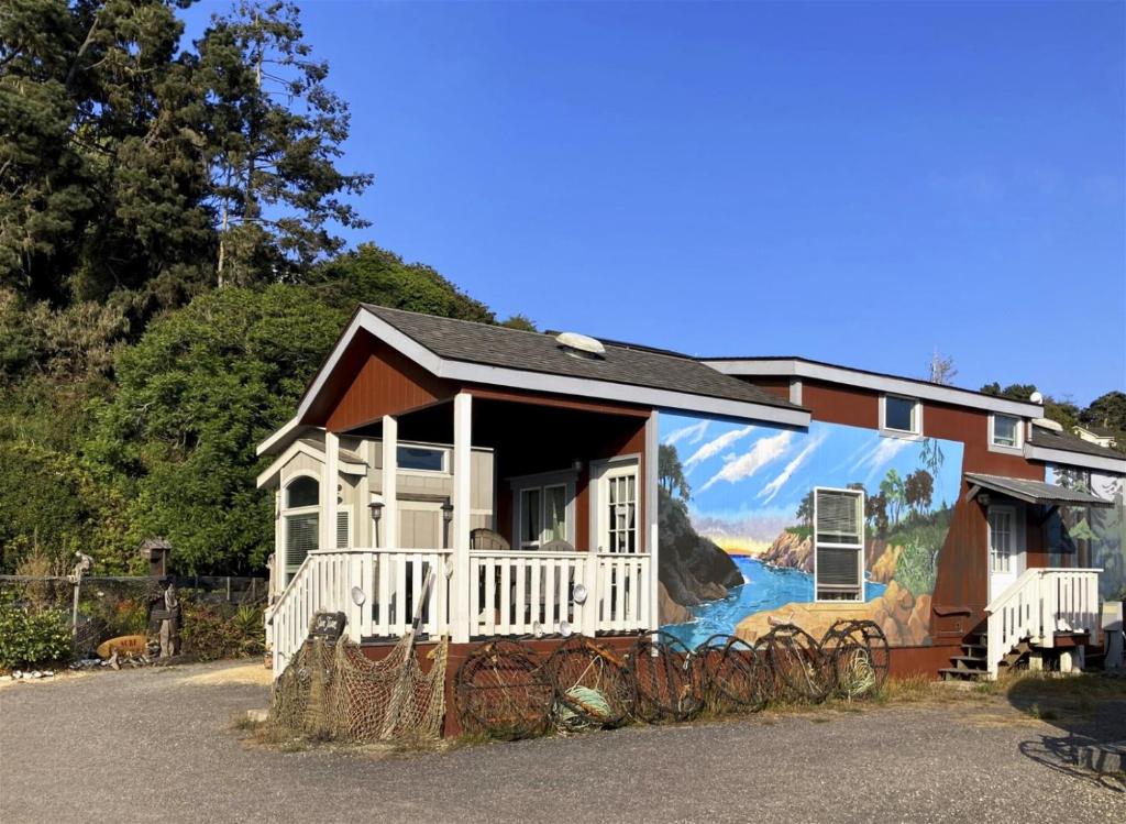 a house with a mural on the side of it at H - San Juan in Fort Bragg