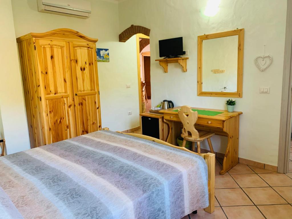 Postel nebo postele na pokoji v ubytování B&B La Baita Del Sud