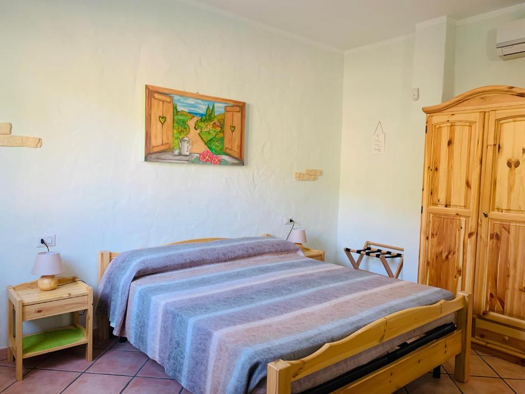 Postel nebo postele na pokoji v ubytování B&B La Baita Del Sud