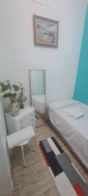 Postel nebo postele na pokoji v ubytování VALENCIA